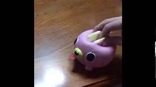 Pink dog toy meme BOOM