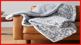 Amazon Basics Fuzzy Faux Fur Sherpa Throw Blanket, 50