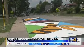 Brightly colored street mural aims to slow down drivers near east side Indy school