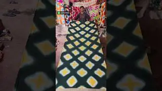 Adire fabric, a traditional resist-dyed textile #shortvideo