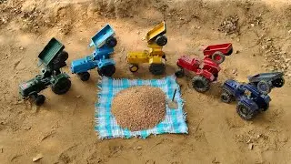 Loading of grains into tractor trolleys properly with a shovel#11