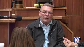 Supermarket owner takes stand in former commissioner's corruption trial