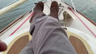 Raymarine ST2000 tiller pilot with remote control in action.
