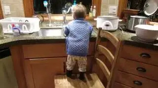 Indy washing dishes