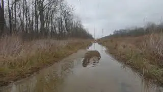Abandoned Road and Puddles on Calumet Trail