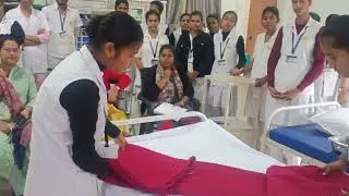 Bed making by our college vananchal nursing training school...