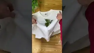 Creating a natural print on my shirt 🔨🌸🌿 by hammering real flowers and leaves!
