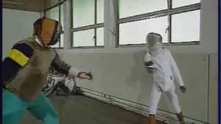 Willi and Somkhit begin fencing.wmv
