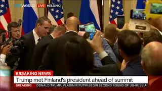 Protester removed from hall before Trump-Putin presser