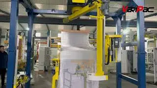 Rotary arm wrapping machine
