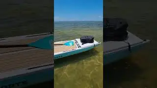 Live Watersports L4 with Sup Custom accessories and Honda 2.3 hp Outboard and Rugged Road cooler.