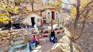 Beautifying the Exterior of a Mountain Cabin: Grandma's Art of Painting Fences