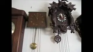 Square wall clock with weights and chains