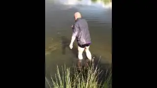 Stig fishing for balls - PKs 40th golf day