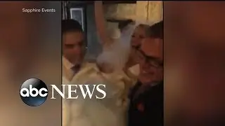 Couple get married in torrential rain