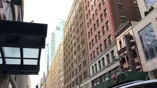 Walking Through NYC Past the Empire State Building