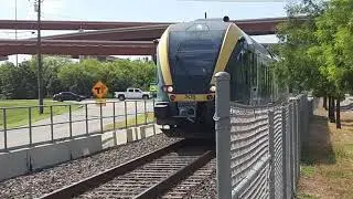 Dcta a train arriving at trinity mills station