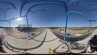 Cycling on the new cycle bridge at Schinveld (mun. Beekdaelen in the Netherlands)