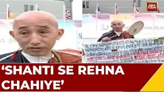 Buddhist Monk Holds Unique Protest for Peace at G7 Summit | WATCH