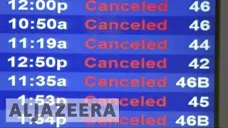 Thousands of flights cancelled as snowstorm hits northeast US