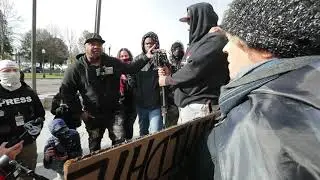 People confront supporter of Kyle Rittenhouse outside Kenosha courthouse