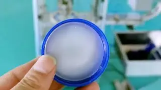 Cap wadding lining machine foil inserting equipment with caps lifting system | آلة حشو القبعات
