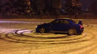 Subaru sti semislick with snow