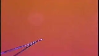 Welding together wire as fine as a spider web strand: Making a Tiny Thermocouple