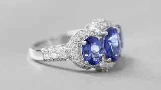 18ct White Gold Tanzanite And Diamond Cluster Ring | The Diamond Drop