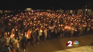Peaceful candlelight vigil moves through UVA campus for Charlottesville