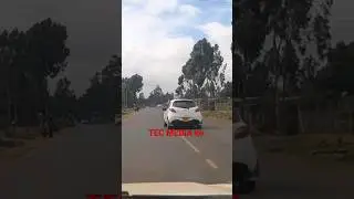 Mazda Demio overtaking