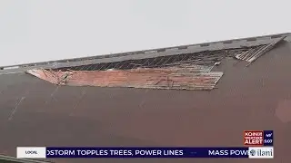 Buildings and vehicles damaged in landslide