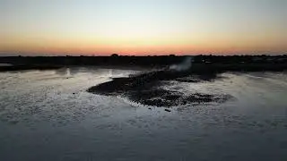 Broome town beach as the sun sets they gather