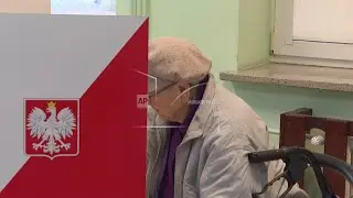 Poles vote in presidential election at time of heightened security concerns