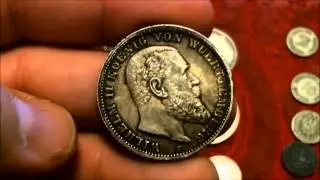 A collection of coins from WWII.
