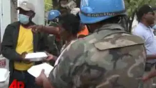 Haiti Quake Victims Protest Slow Aid Handout