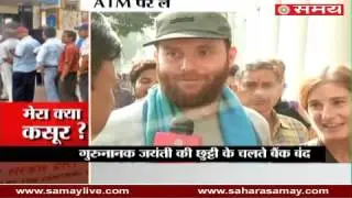 People Reactions on long queues out of the ATM to cash in Delhi