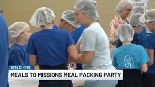 Montgomery Catholic holds Meals to Missions meal packing party