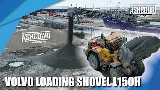 Volvo loading shovel L150H assisting the SELF-DISCHARGER aggregate cargo ship