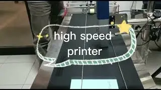 Domino inkjet printer AX150i dengan feeder system.
