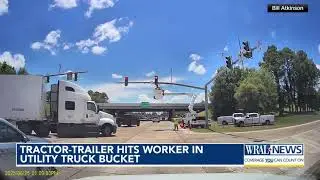 ON CAM: Louisiana tractor-trailer hits worker in utility truck bucket