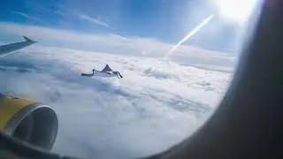 A Giant Manta Ray Flying in the Sky