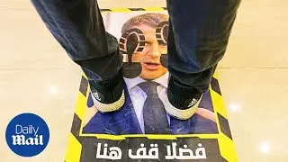 Libya cafe uses Macron face stickers to observe social distancing