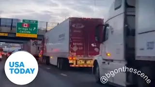Truckers shut down bridge to protest vaccine mandate | USA TODAY