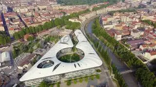 Turin, Italy - July 12, 2019: University of Turin - Campus Luigi Einaudi. Flight over the city. Top