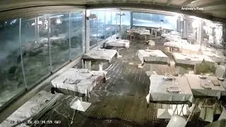 Italian restaurant flooded by Cyclone Harry storm surge | REUTERS