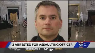 Two men charged in assaulting Capitol police officer during insurrection