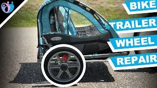 how to replace a wheel on instep bike trailer |  bike trailer repair