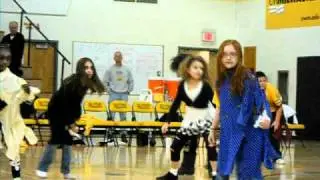 Desi in Thriller..wearing plaid skirt.