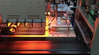 Sunnyworld solar cell tabber and stringer in debugging before shipment 20150409 B